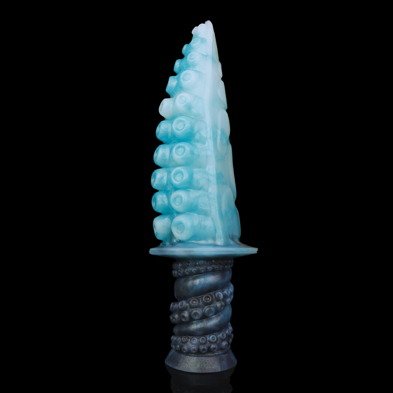 Moros the Deep One dildo, Abyss colorway, three-quarter view showing the icy blue tip fading into the star-flecked charcoal handle