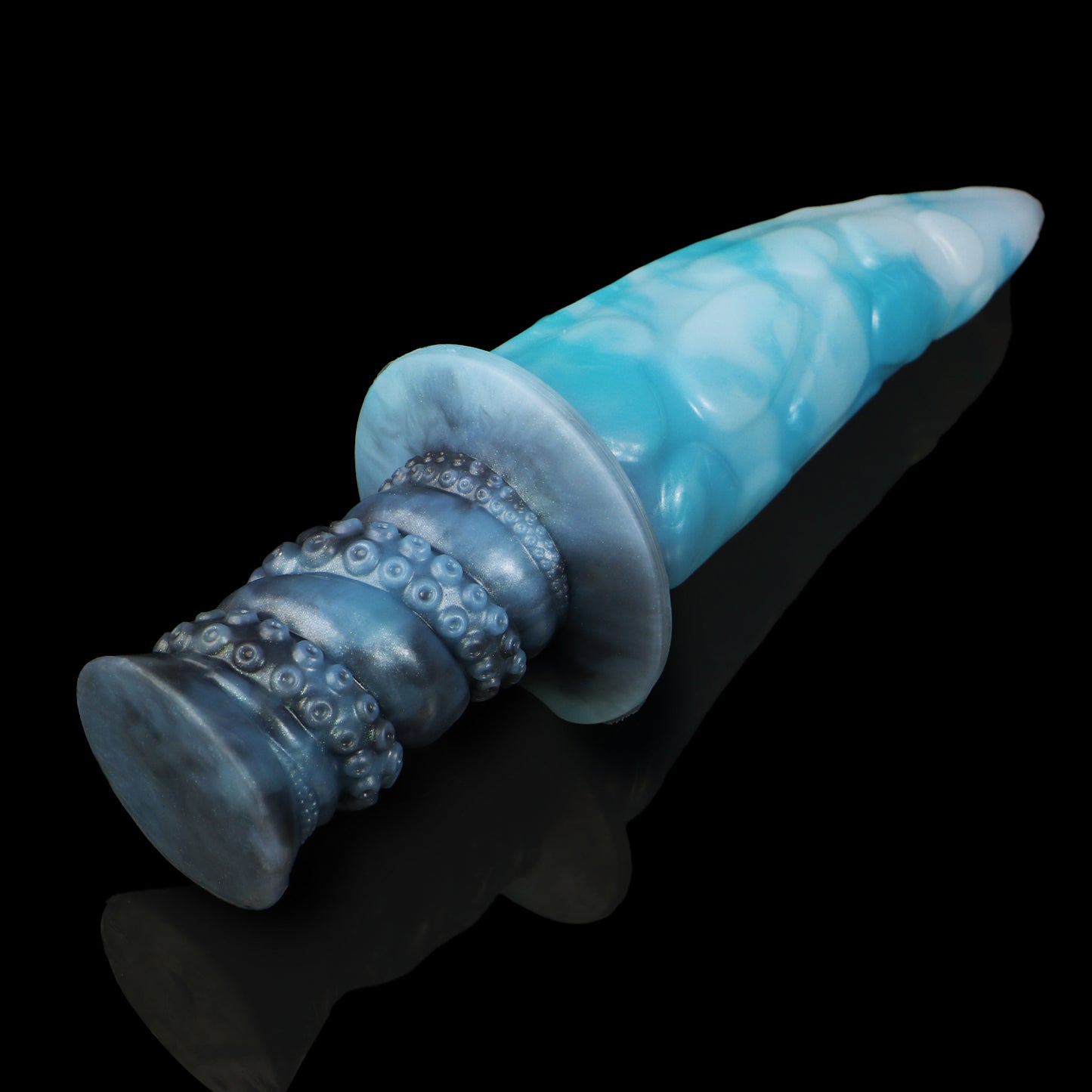 Moros the Deep One dildo, Abyss colorway, angled view with the ergonomic ribbed handle in the foreground