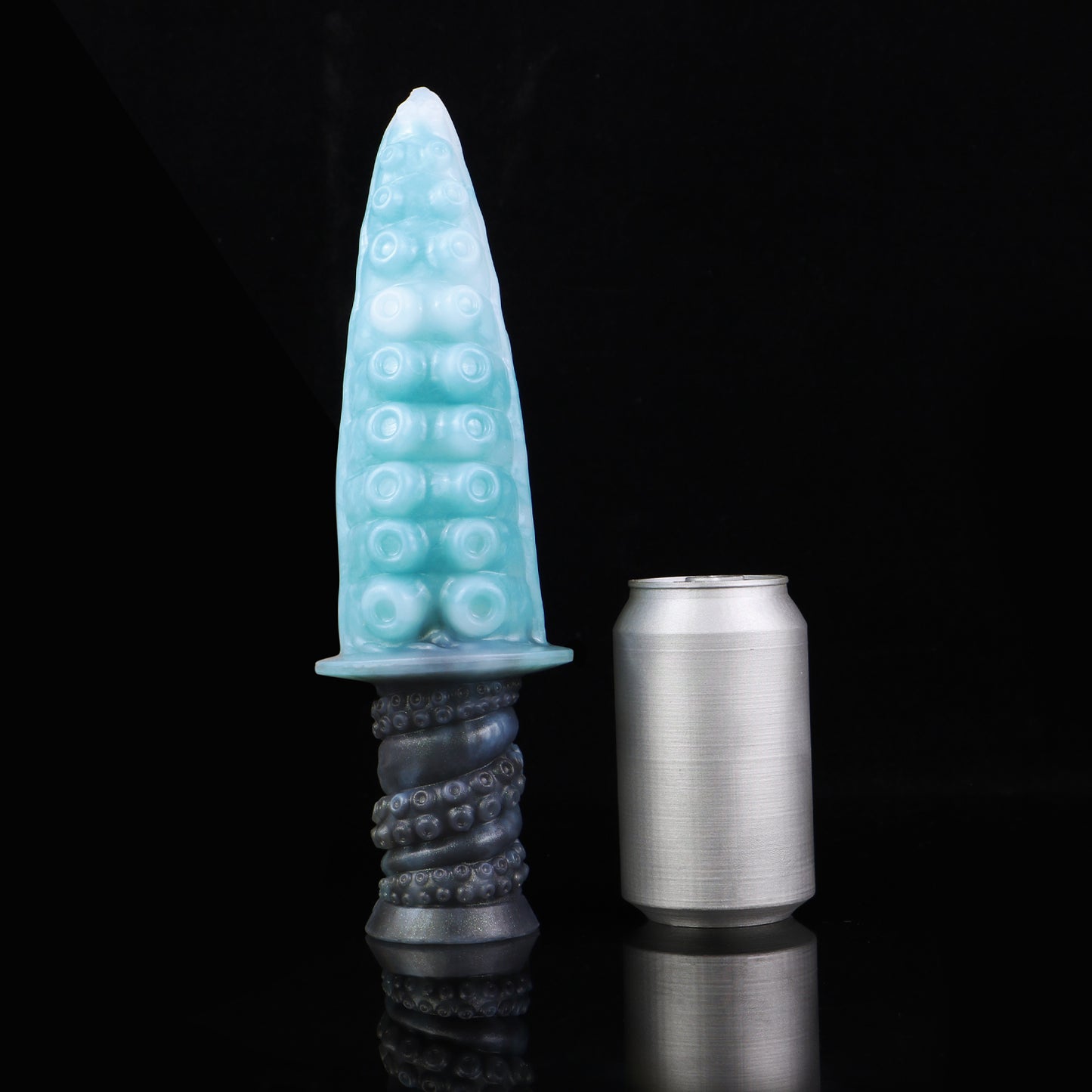 Moros the Deep One dildo, Abyss colorway, standing upright beside a soda can for size comparison
