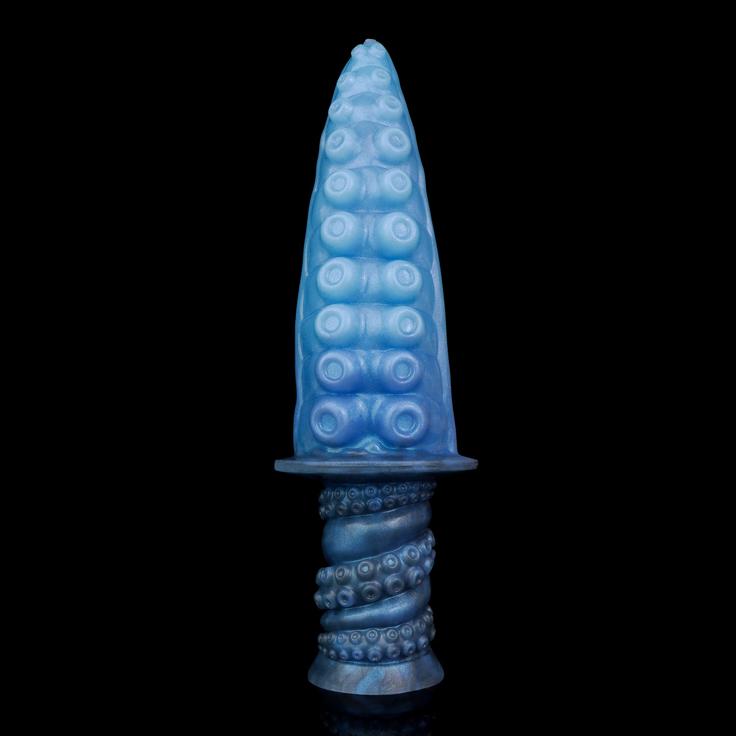 Moros the Deep One dildo, Arctic colorway, standing upright on its ergonomic handle showing the sucker-textured tapered tip