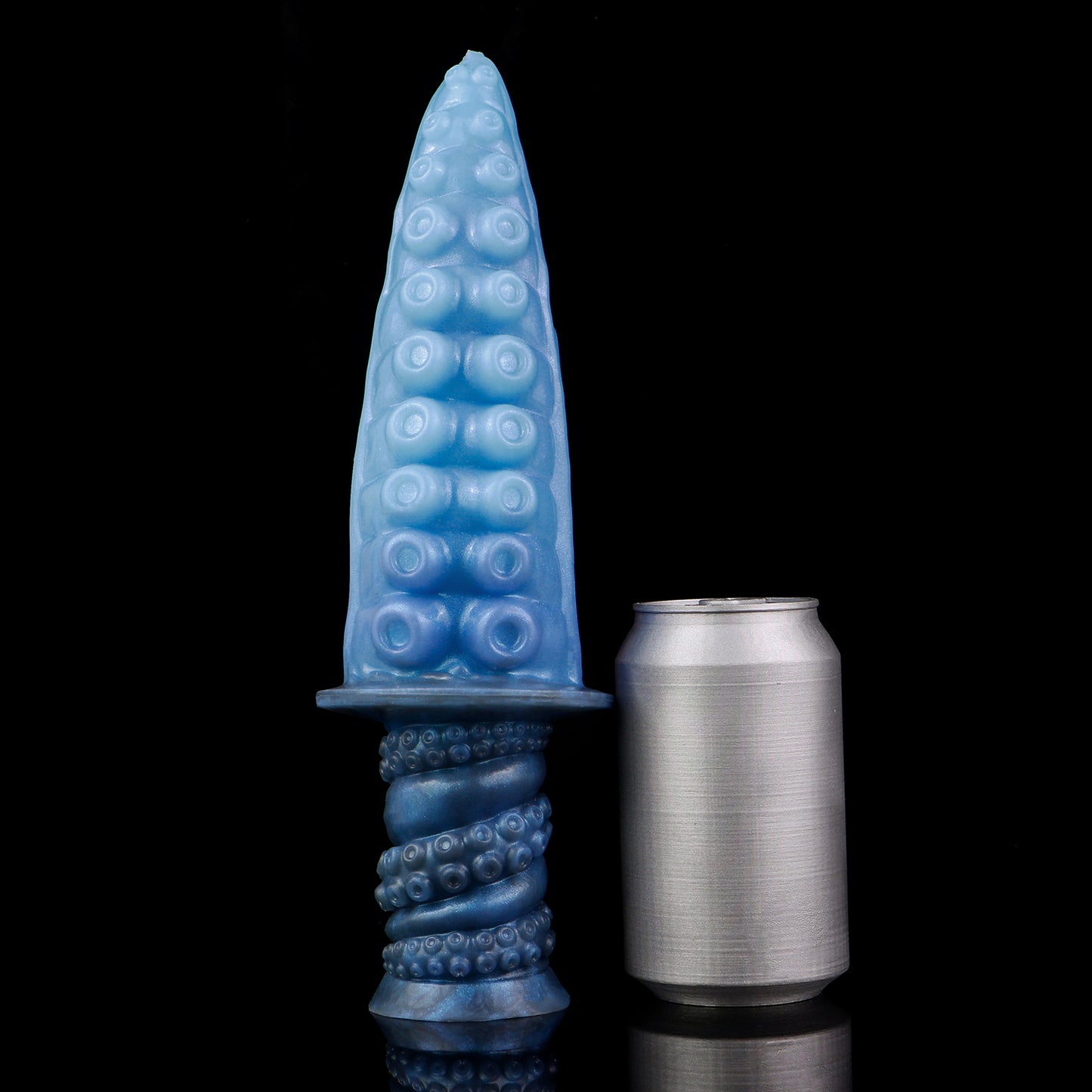 Moros the Deep One dildo, Arctic colorway, standing upright beside a soda can for size comparison