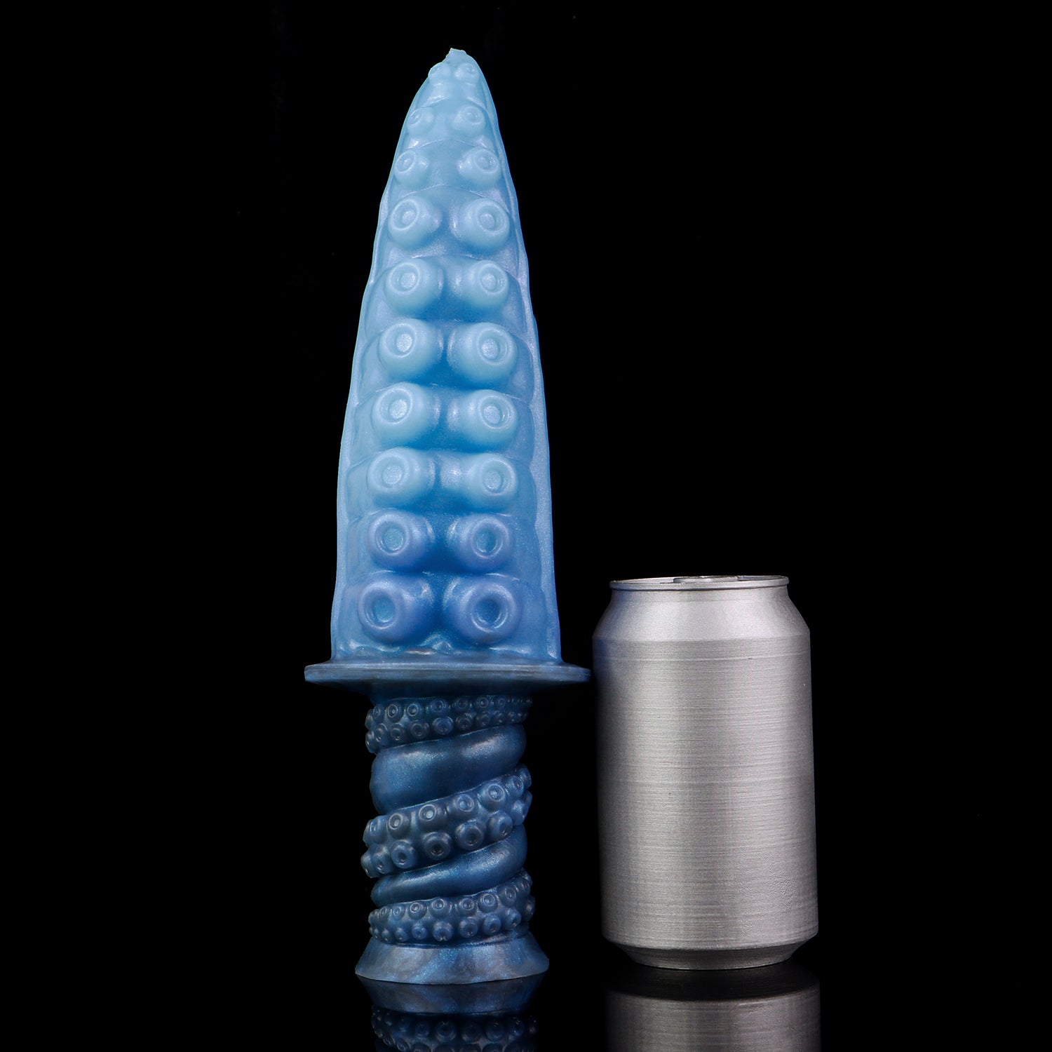 Moros the Deep One dildo, Arctic colorway, standing upright beside a soda can for size comparison