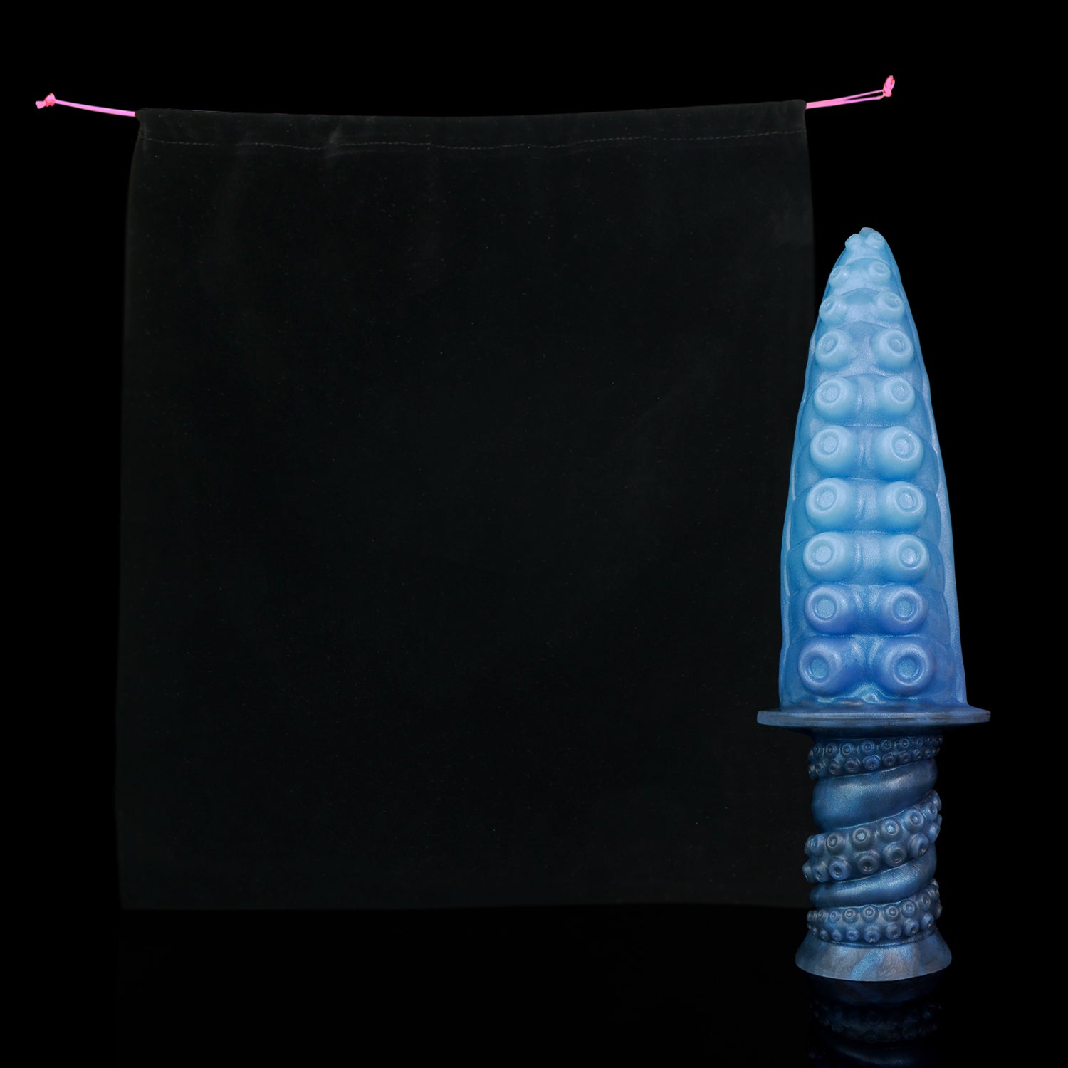 Moros the Deep One dildo, Arctic colorway, shown alongside the included black Lunara's Realm storage pouch