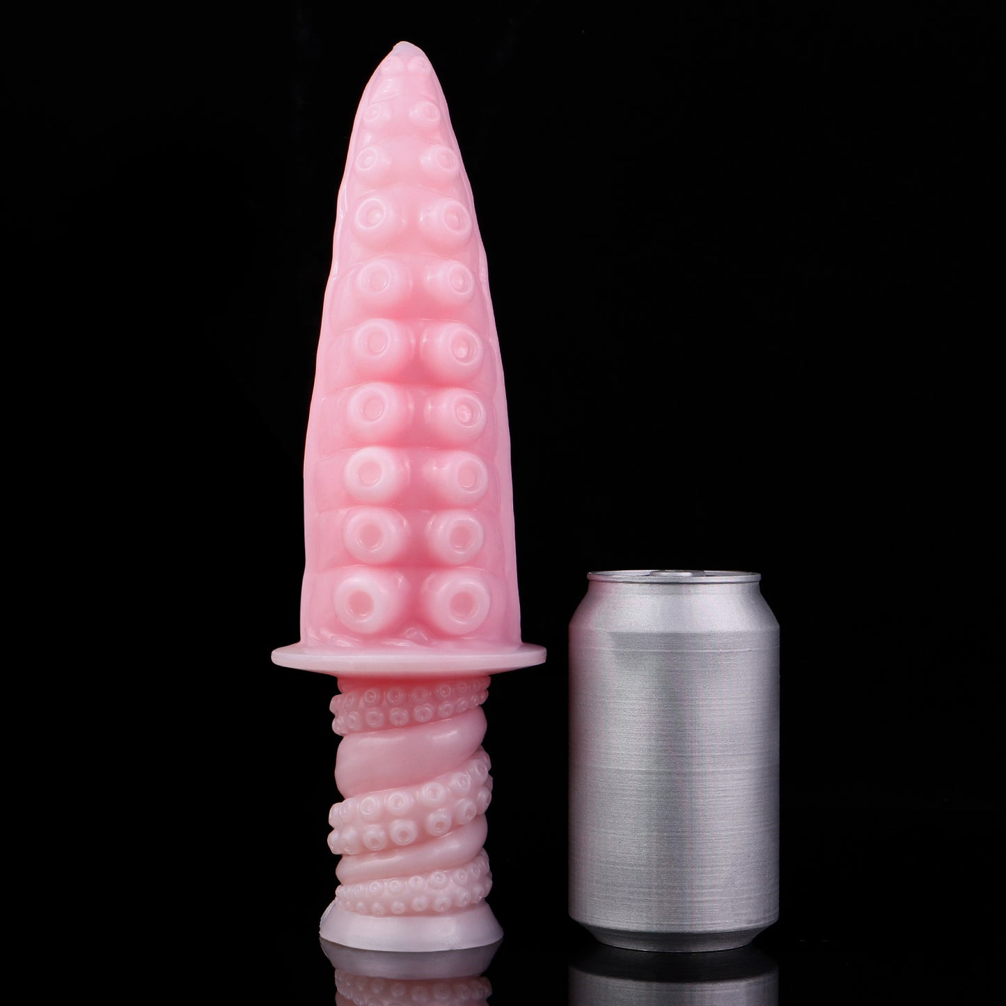 Moros the Deep One dildo, Fairy Floss colorway, standing upright beside a soda can for size comparison