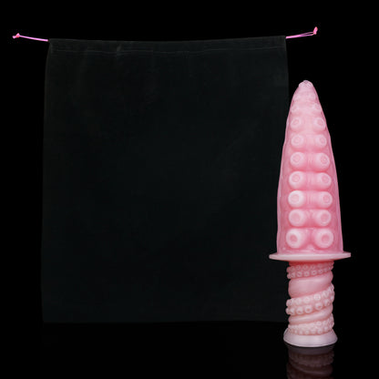 Moros the Deep One dildo, Fairy Floss colorway, shown alongside the included black Lunara's Realm storage pouch