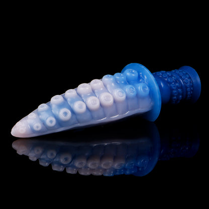 Moros the Deep One dildo, Flux colorway, lying on its side in full profile showing the rows of suckers