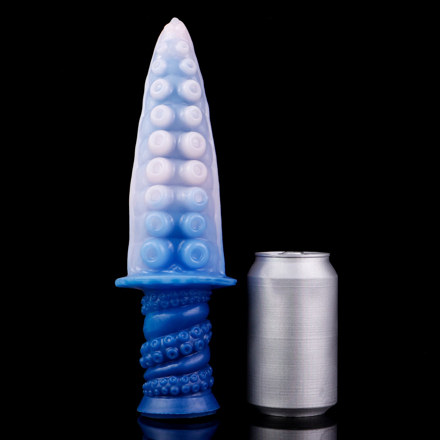 Moros the Deep One dildo, Flux colorway, standing upright beside a soda can for size comparison