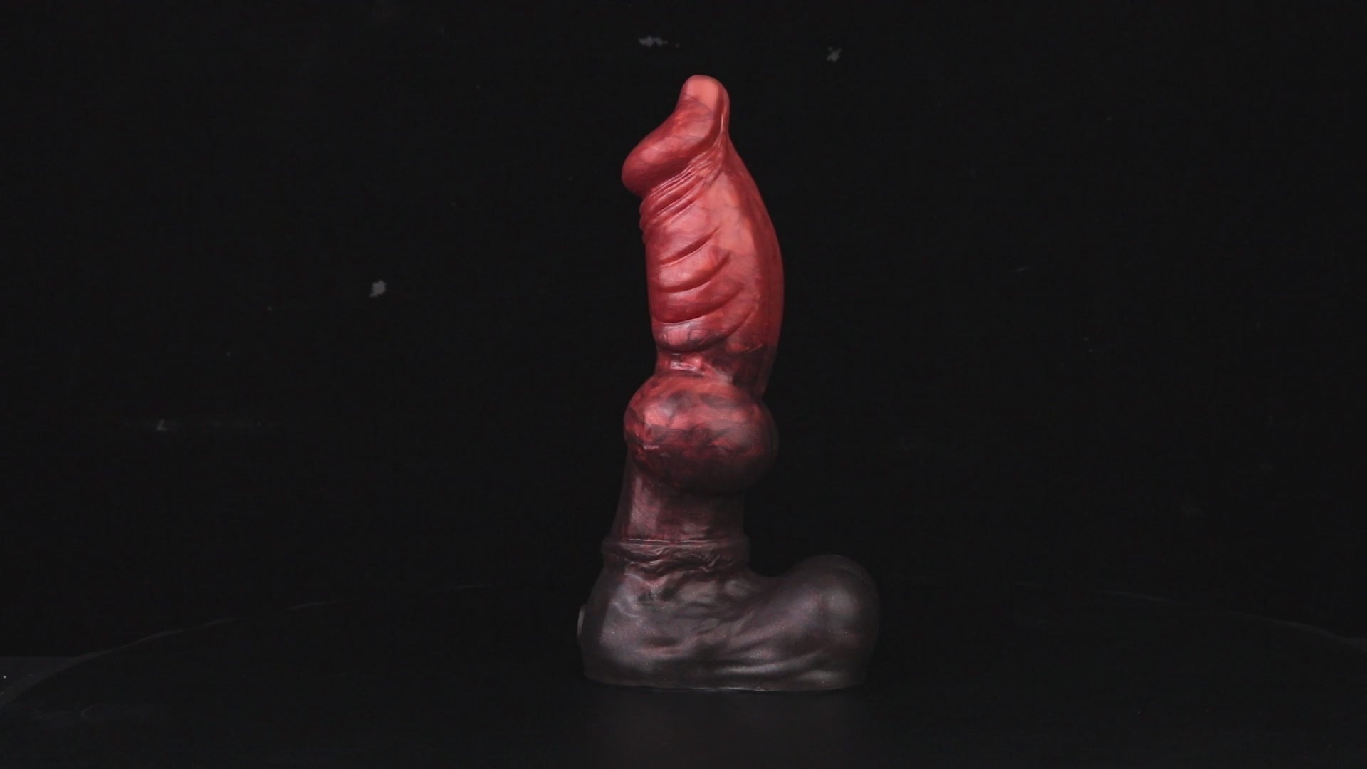 Vulpes the Nightfox dildo, Lava colorway, product video showing the piece standing upright on its rounded base