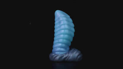 Kael the Dragonkin dildo, Arctic colorway, product video showing the piece standing on its scale-textured base
