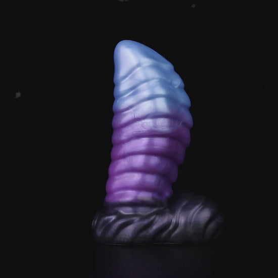 Kael the Dragonkin dildo, Spectre colorway, product video showing the piece standing on its scale-textured base
