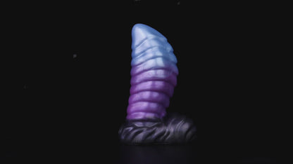 Kael the Dragonkin dildo, Spectre colorway, product video showing the piece standing on its scale-textured base