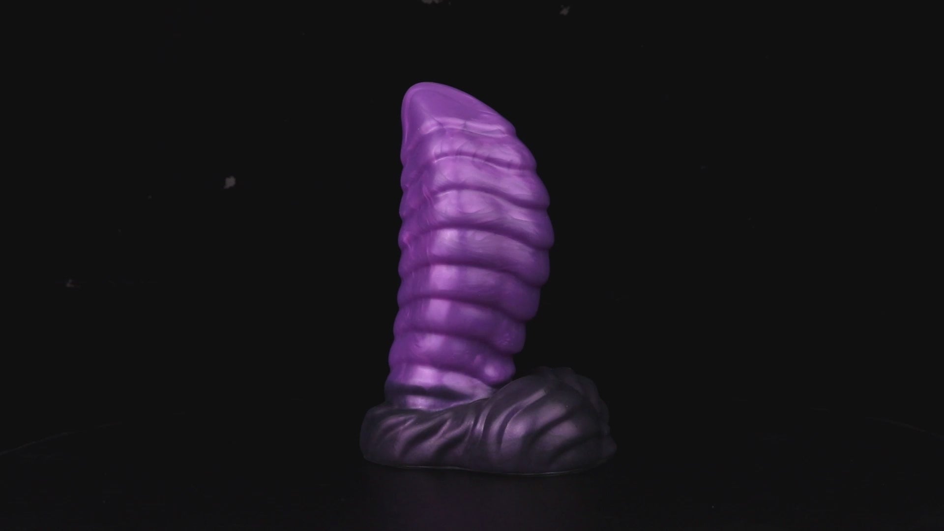 Kael the Dragonkin dildo, Grape colorway, product video showing the piece standing on its scale-textured base