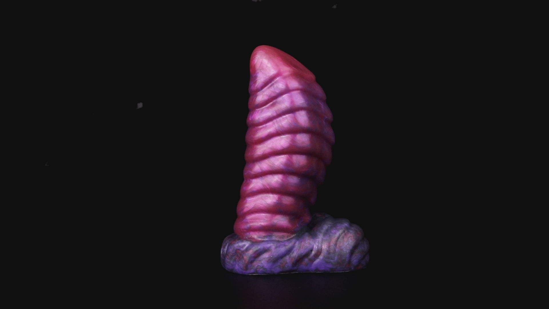 Kael the Dragonkin dildo, Adrenaline colorway, product video showing the piece standing on its scale-textured base