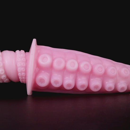 Moros the Deep One dildo, Fairy Floss colorway, product video showing the sucker-textured tentacle and ergonomic handle