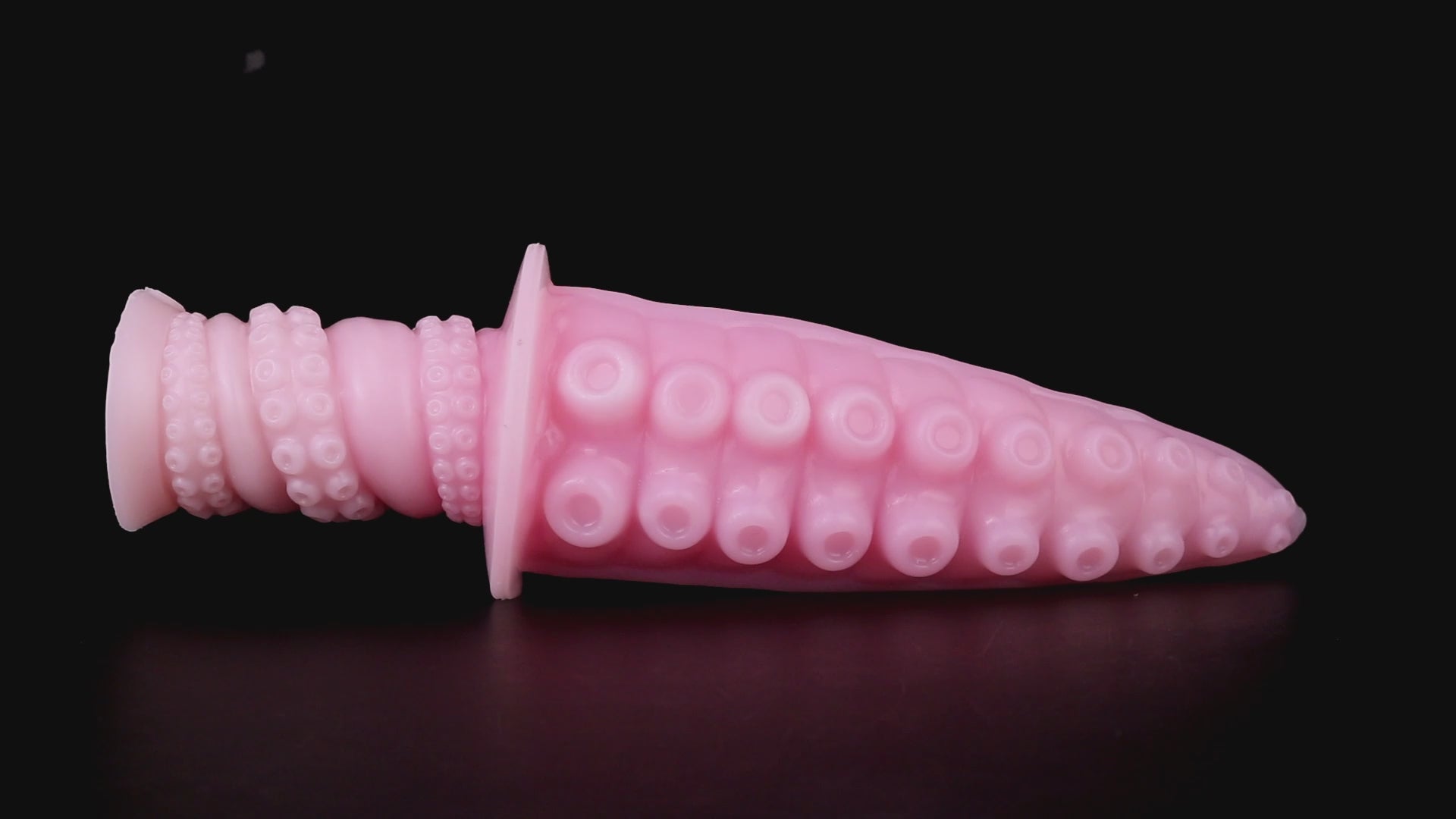 Moros the Deep One dildo, Fairy Floss colorway, product video showing the sucker-textured tentacle and ergonomic handle