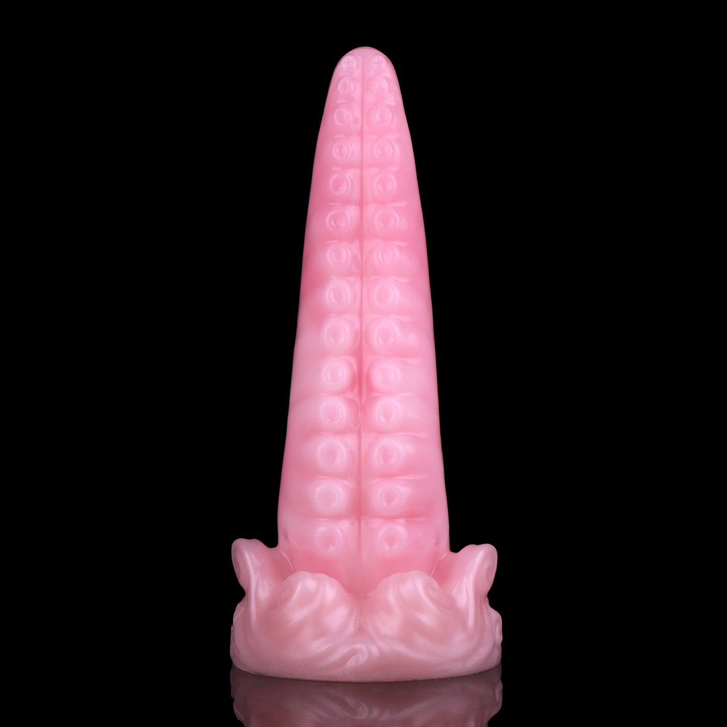 Tendrul the Tentacle dildo, Fairy Floss colorway, standing upright showing the smooth back of the tentacle in soft shimmering pink