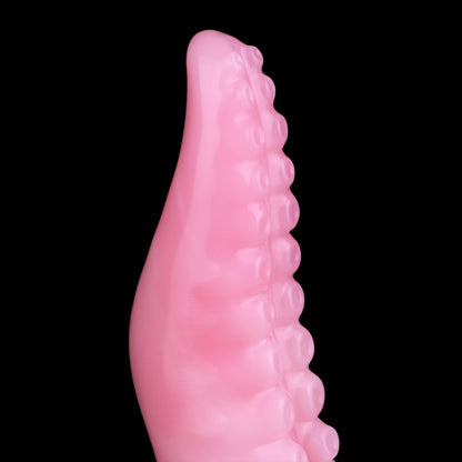 Tendrul the Tentacle dildo, Fairy Floss colorway, close-up of the curved tentacle showing the sucker detail