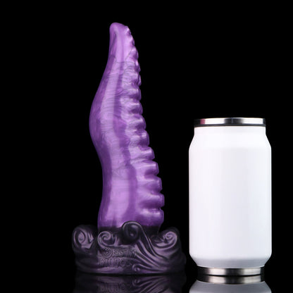 Tendrul the Tentacle dildo, Grape colorway, standing upright beside a soda can for size comparison