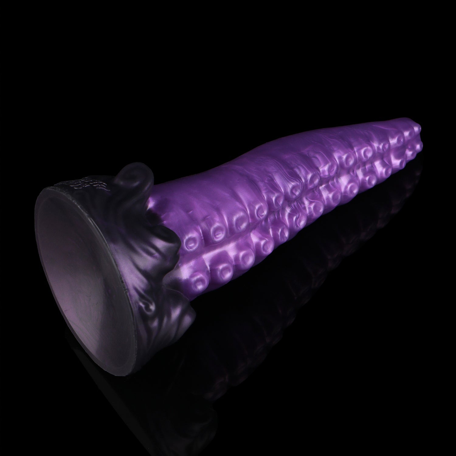 Tendrul the Tentacle dildo, Grape colorway, tilted to show the whirlpool-wave suction cup base