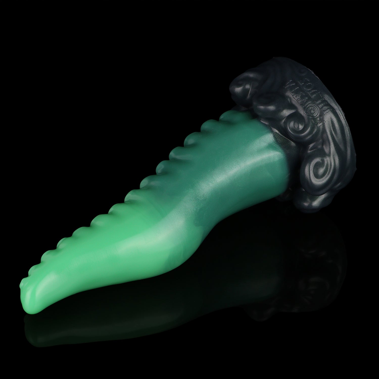 Tendrul the Tentacle dildo, Ogre colorway, lying at an angle showing the underside of the tapering tentacle