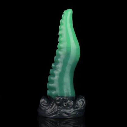 Tendrul the Tentacle dildo, Ogre colorway, standing upright with the tentacle curving to one side