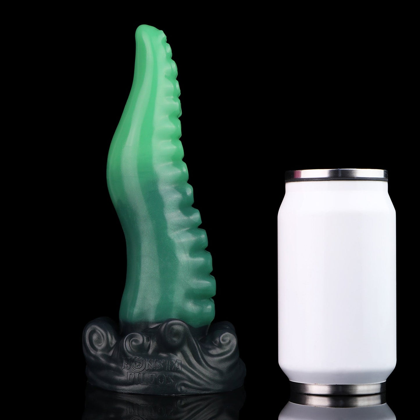Tendrul the Tentacle dildo, Ogre colorway, standing upright beside a soda can for size comparison