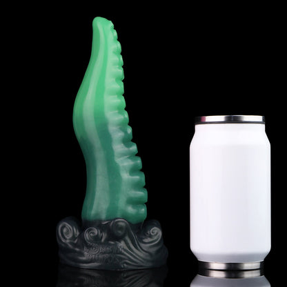 Tendrul the Tentacle dildo, Ogre colorway, standing upright beside a soda can for size comparison