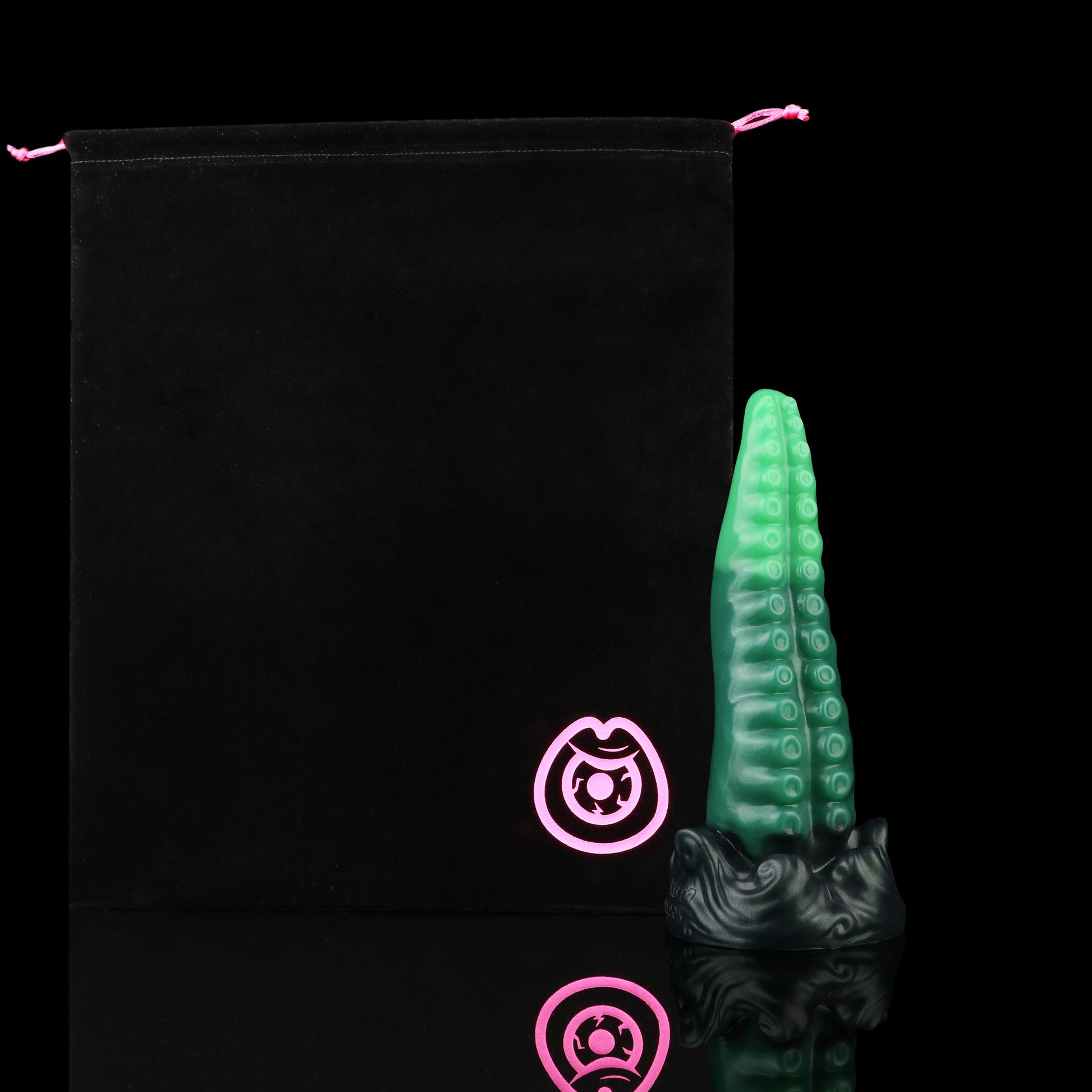 Tendrul the Tentacle dildo, Ogre colorway, shown alongside the included black Lunara's Realm storage pouch
