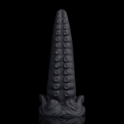 Tendrul the Tentacle dildo, Shadow colorway, standing upright on its whirlpool-wave suction base with the suckers facing forward