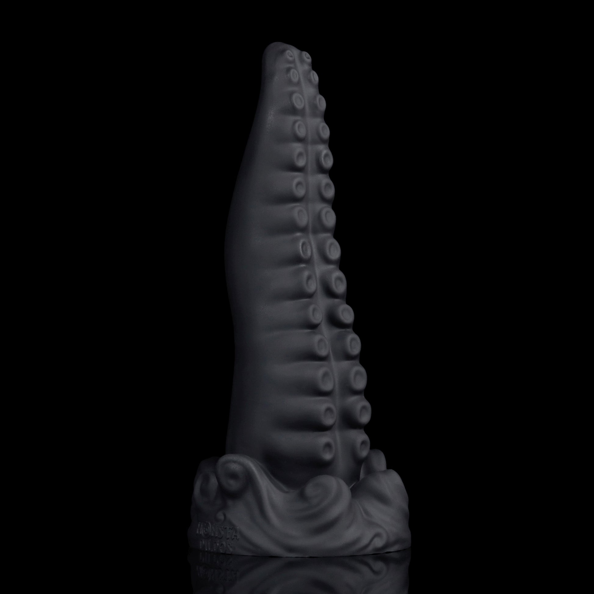 Tendrul the Tentacle dildo, Shadow colorway, standing upright showing the curve of the tentacle and its incremental expansion