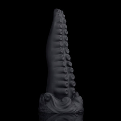 Tendrul the Tentacle dildo, Shadow colorway, standing upright showing the curve of the tentacle and its incremental expansion