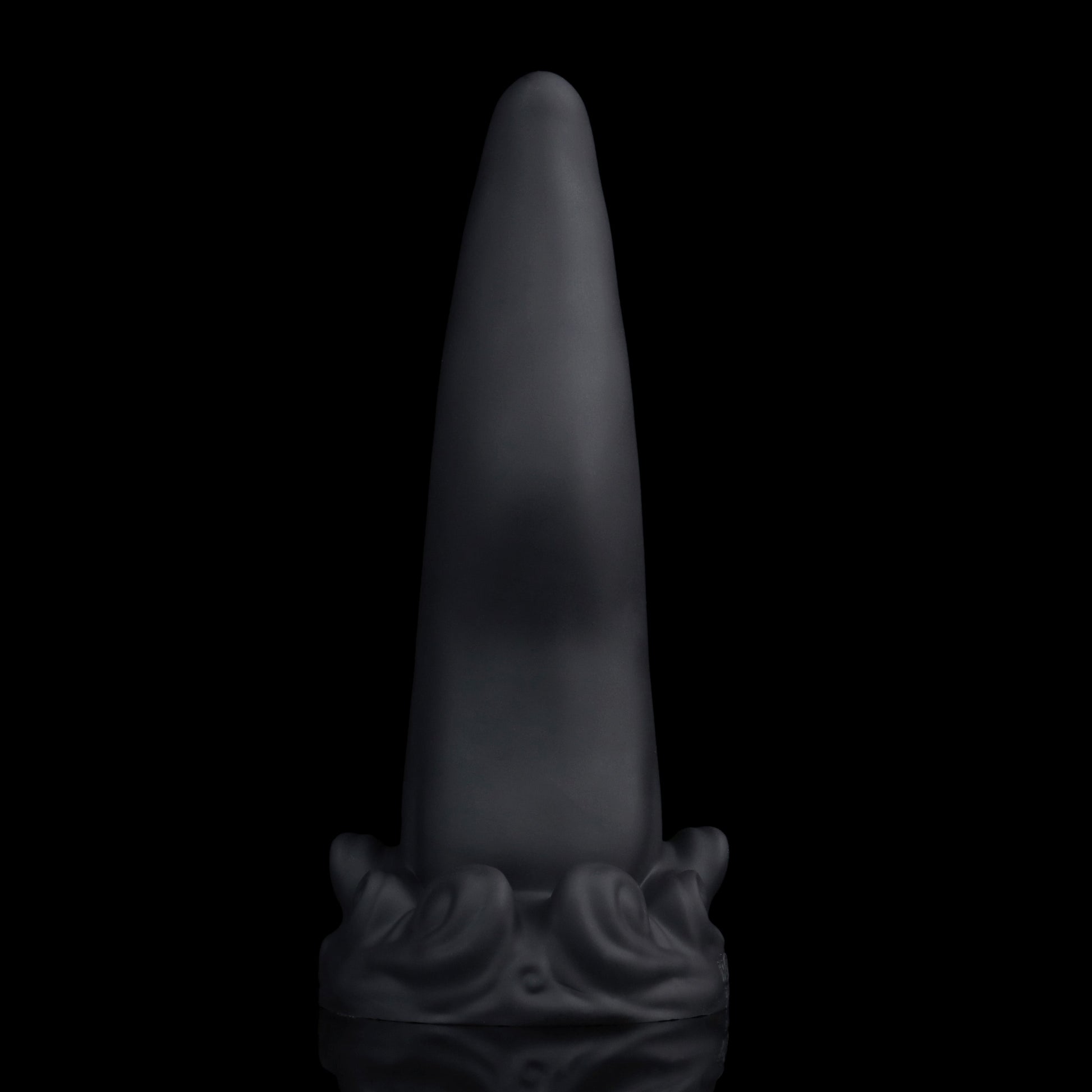 Tendrul the Tentacle dildo, Shadow colorway, standing upright showing the smooth back of the tentacle in deep matte black
