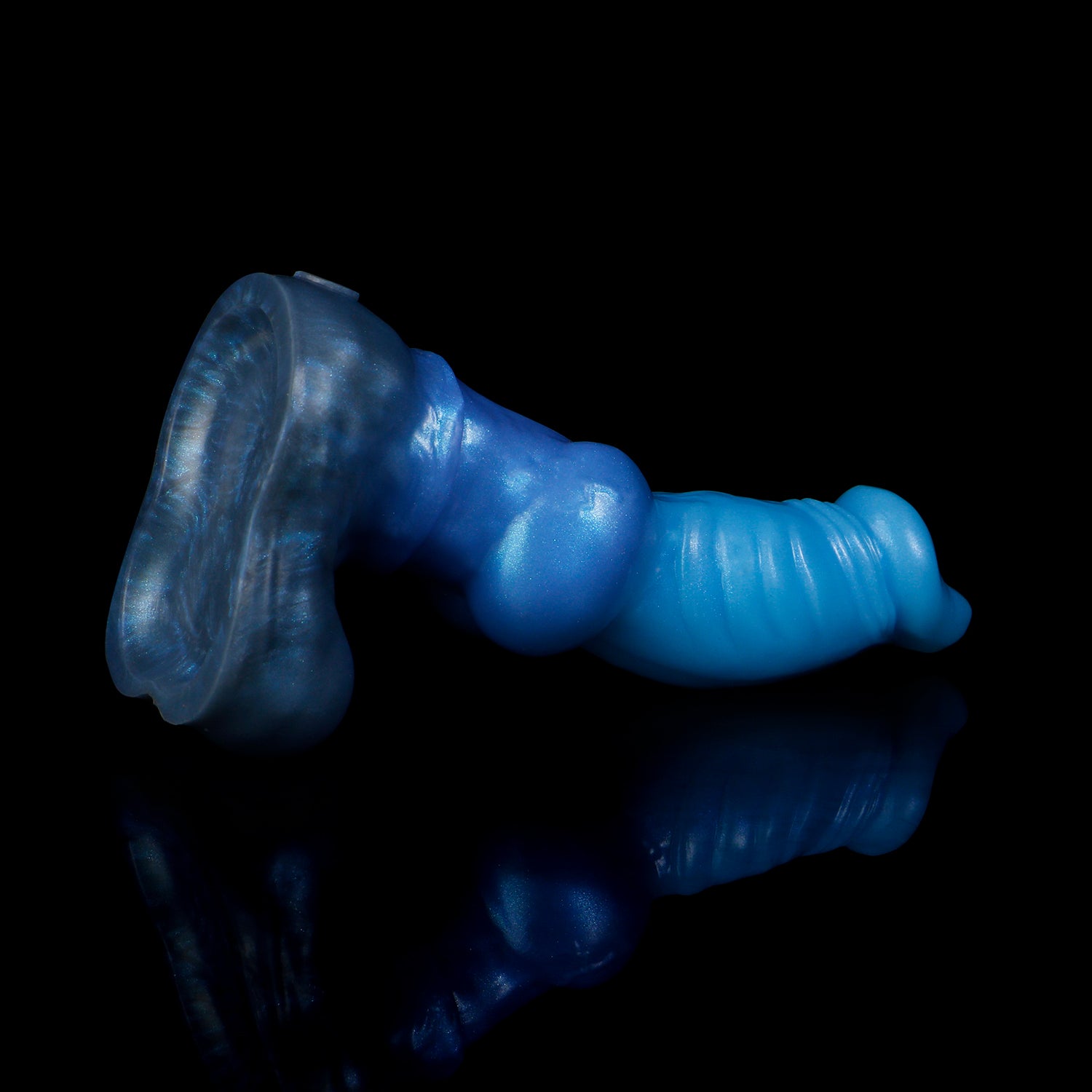 Vulpes the Nightfox dildo, Arctic colorway, angled to show the sturdy rounded suction base