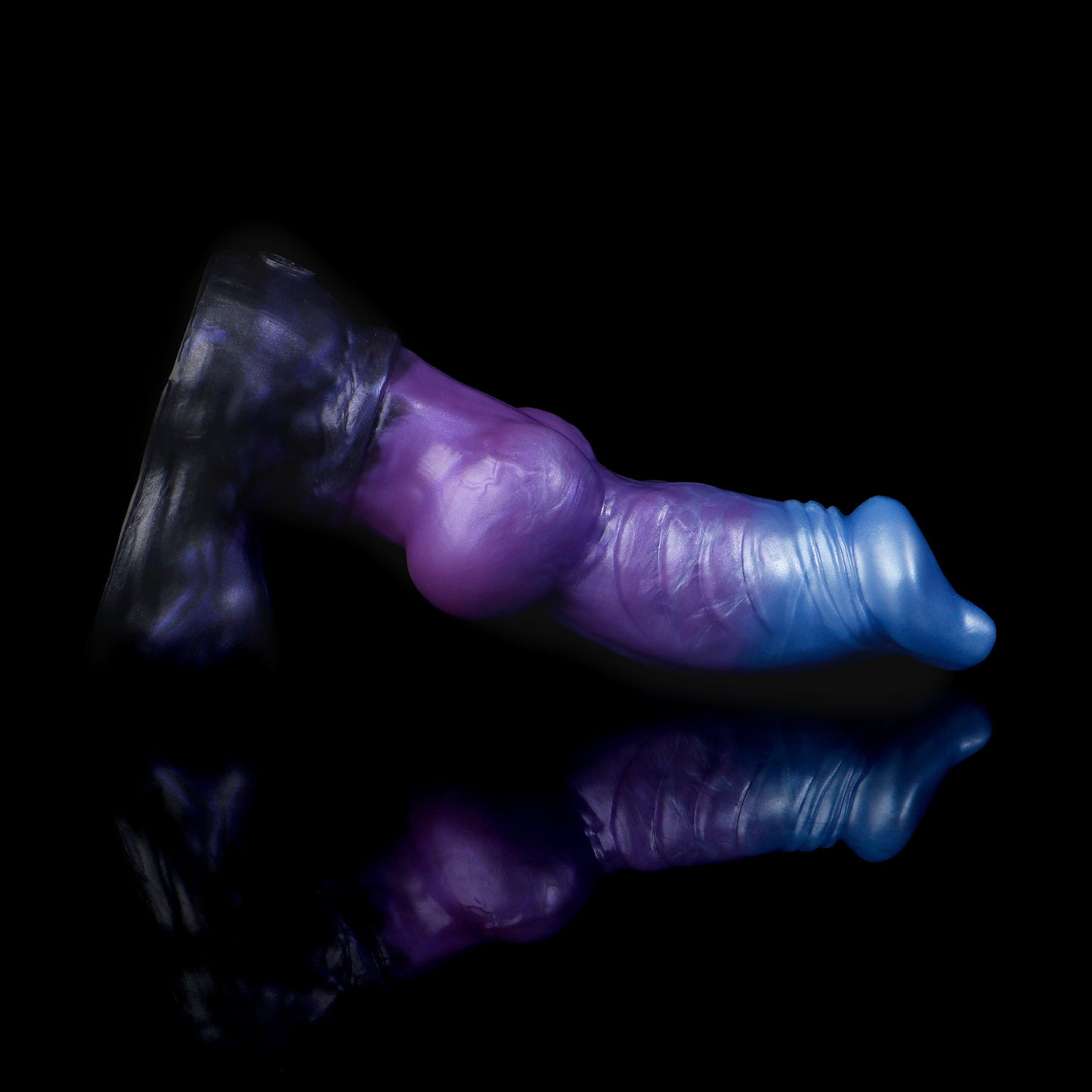 Vulpes the Nightfox dildo, Spectre colorway, lying on its side in full profile showing the upward curve of the tip